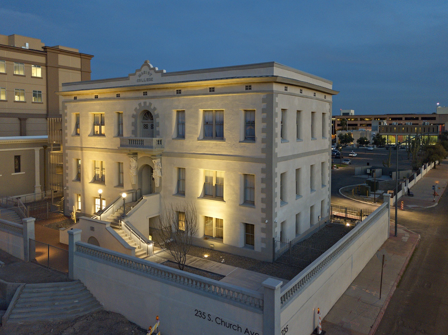 A large white building with the number 235 on the bottom right.